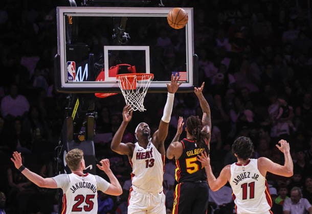NBA, Basketball Herren, USA Miami Heat vs Atlanta Hawks game Miami Heat Center Forward Bam Adebayo (L) in action against Atlanta Hawks Guard Keshon Gilbert during the NBA basketball game between the Miami Heat and the Atlanta Hawks at the Kaseya Center in Miami, Florida, USA, 12 April 2026. MIAMI FLORIDA United States  Copyright: xCRISTOBALxHERRERA-ULASHKEVICHx