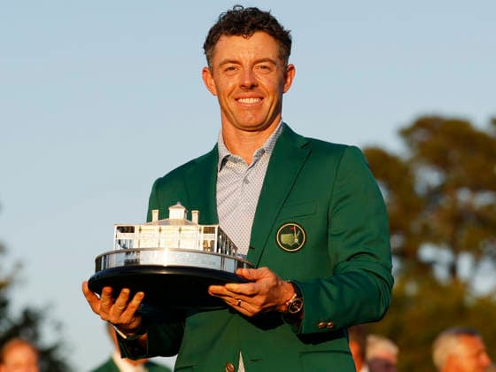 Rory McIlroy of Northern Ireland holds his trophy after winning the 2026 Masters Tournament at Augusta National Golf Club on Sunday, April 12, 2026, in Augusta, Georgia. McIlroy won his second consecutive Masters with a 12-under-par four-day score of 276.  AUG202604128903 JOHNxANGELILLO