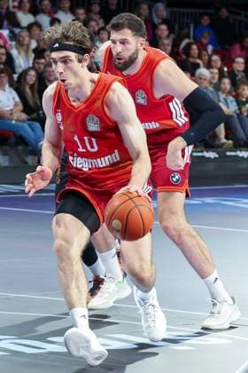 Justinian Jessup 10 FC Bayern Muenchen Basketball in action, behind Leon Kratzer 8 FC Bayern Muenchen Basketball , FC Bayern Muenchen Basketball vs Niners Chemnitz, easyCredit BBL, Basketball, Bundesliga, Men, Main Round, April 12, 2026 Muenchen Bayern Germany Copyright: xkolbert-press MartinxAgüerax