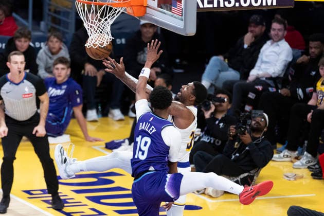 April 12, 2026, Los Angeles, California, USA: Los Angeles LakersÃ¢â‚¬â ¢ Marcus Smart (36) goes to the basket under pressure from Utah JazzÃ¢â‚¬â ¢ Ace Bailey (19) during an NBA, Basketball Herren, USA basketball game at Crypto.com Arena on Sunday, April 12, 2026 in Los Angeles. NBA 2026: Jazz Vs Lakers  - ZUMAc68_ 20260412_zaf_c68_005 Copyright: xRingoxChiux