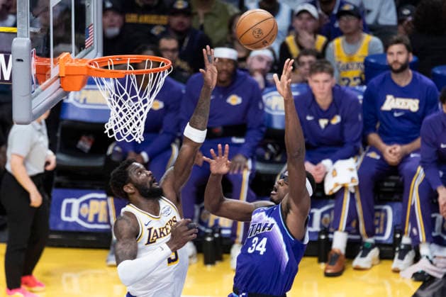 April 12, 2026, Los Angeles, California, USA: Utah JazzÃ¢â‚¬â ¢ Oscar Tshiebwe (34) shoots against Los Angeles LakersÃ¢â‚¬â ¢ Deandre Ayton (5) during an NBA, Basketball Herren, USA basketball game at Crypto.com Arena on Sunday, April 12, 2026 in Los Angeles. NBA 2026: Jazz Vs Lakers  - ZUMAc68_ 20260412_zaf_c68_017 Copyright: xRingoxChiux