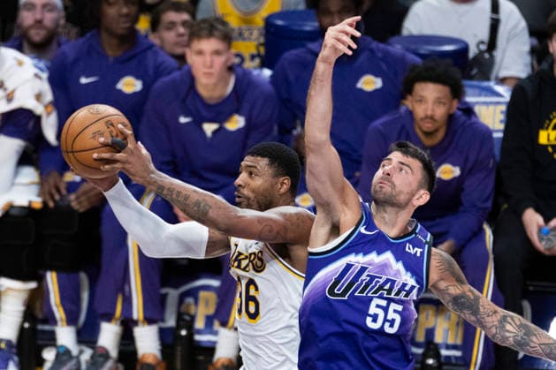 April 12, 2026, Los Angeles, California, USA: Los Angeles LakersÃ¢â‚¬â ¢ Marcus Smart (36) and Utah JazzÃ¢â‚¬â ¢ John Konchar (55) vie for the ball during an NBA, Basketball Herren, USA basketball game at Crypto.com Arena on Sunday, April 12, 2026 in Los Angeles. NBA 2026: Jazz Vs Lakers  - ZUMAc68_ 20260412_zaf_c68_019 Copyright: xRingoxChiux