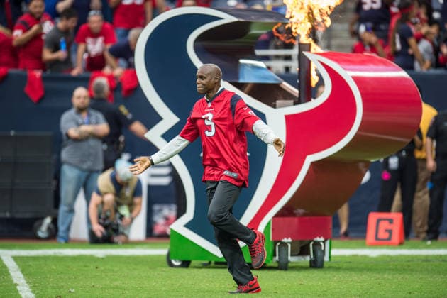 Nov. 2, 2014 - Houston, Texas, U.S - Olympic track and field gold medalist Carl Lewis enters the field as the honorary captain prior to an NFL, American Football Herren, USA game between the Houston Texans and the Philadelphia Eagles at NRG Stadium in Houston, TX on November 2nd, 2014. The Eagles won the game 31-21. Copyright: xTraskxSmithx