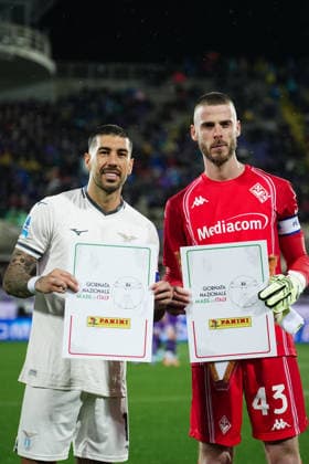 LazioÕs Mattia Zaccagni and FiorentinaÕs David De Gea Quintana with a Panini card for the International day of Made in Italy during the Serie A soccer match between Fiorentina and Lazio at the Artemio Franchi Stadium in Florence, north Italy - Monday, April 13, 2026 -  Copyright: xMassimoxPaolone LaPressex