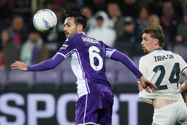 FiorentinaÕs Luca Ranieri fights for the ball with LazioÕs Kenneth Ina Dorothea Taylor during the Serie A soccer match between Fiorentina and Lazio at the Artemio Franchi Stadium in Florence, north Italy - Monday, April 13, 2026 -  Copyright: xMassimoxPaolone LaPressex