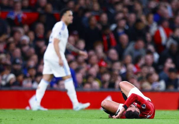 Bruno Fernandes of Manchester United, ManU appears to be injured as Leeds United score their second goal 0-2 Manchester United v Leeds United, Premier League, Football, Old Trafford, Manchester, UK - 13 Apr 2026Manchester Old Trafford United Kingdom EDITORIAL USE ONLY No use with unauthorised audio, video, data, fixture lists, club league logos or live services. Online in-match use limited to 120 images, no video emulation. No use in betting, games or single club league player publications. Copyright: xMattxWest Shutterstockx 16827177z