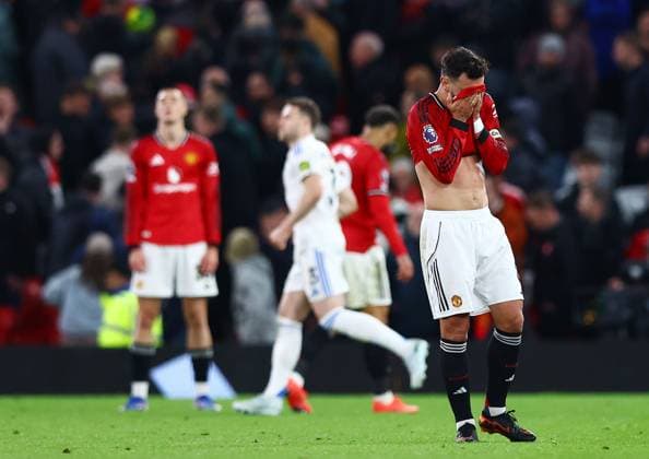 Bruno Fernandes of Manchester United, ManU looks dejected at the end of the match Manchester United v Leeds United, Premier League, Football, Old Trafford, Manchester, UK - 13 Apr 2026Manchester Old Trafford United Kingdom EDITORIAL USE ONLY No use with unauthorised audio, video, data, fixture lists, club league logos or live services. Online in-match use limited to 120 images, no video emulation. No use in betting, games or single club league player publications. Copyright: xMattxWest Shutterstockx 16827177ba