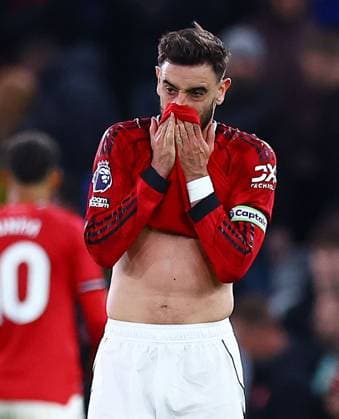 Bruno Fernandes of Manchester United, ManU looks dejected at the end of the match Manchester United v Leeds United, Premier League, Football, Old Trafford, Manchester, UK - 13 Apr 2026Manchester Old Trafford United Kingdom EDITORIAL USE ONLY No use with unauthorised audio, video, data, fixture lists, club league logos or live services. Online in-match use limited to 120 images, no video emulation. No use in betting, games or single club league player publications. Copyright: xMattxWest Shutterstockx 16827177bc