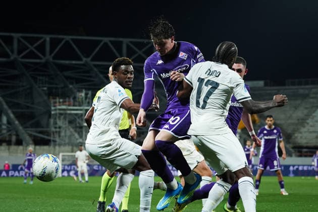 FiorentinaÕs Giovanni Fabbian fights for the ball with LazioÕs Oluwafisayo Faruq Dele-Bashiru and LazioÕs Nuno Albertino Varela Tavares during the Serie A soccer match between Fiorentina and Lazio at the Artemio Franchi Stadium in Florence, north Italy - Monday, April 13, 2026 -  Copyright: xMassimoxPaolone LaPressex