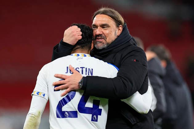Manchester United, ManU v Leeds United, Premier League Daniel Farke the Leeds United manager embraces James Justin (24) of Leeds United at the end of the Premier League match between Manchester United and Leeds United at Old Trafford, Manchester, UK on 13 April 2026. Manchester Old Trafford Greater Manchester UK Editorial use only DataCo restrictions apply See www.football-dataco.com , Copyright: xConorxMolloyx PSI-24063-0083