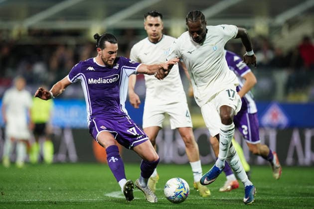 LazioÕs Nuno Albertino Varela Tavares fights for the ball with FiorentinaÕs Jack Harrison during the Serie A soccer match between Fiorentina and Lazio at the Artemio Franchi Stadium in Florence, north Italy - Monday, April 13, 2026 -  Copyright: xMassimoxPaolone LaPressex