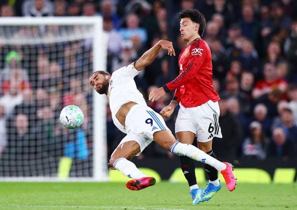 Dominic Calvert-Lewin of Leeds United and Lisandro Martinez of Manchester United, ManU Manchester United v Leeds United, Premier League, Football, Old Trafford, Manchester, UK - 13 Apr 2026Manchester Old Trafford United Kingdom EDITORIAL USE ONLY No use with unauthorised audio, video, data, fixture lists, club league logos or live services. Online in-match use limited to 120 images, no video emulation. No use in betting, games or single club league player publications. Copyright: xMattxWest Shutterstockx 16827177bh