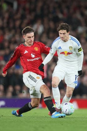 Manchester United, ManU v Leeds United - Premier League Manuel Ugarte of Manchester United and Brenden Aaronson of Leeds United challenge during the Premier League match between Manchester United and Leeds United at Old Trafford on April 13, 2026 in Manchester, England. WARNING! This Photograph May Only Be Used For Newspaper And Or Magazine Editorial Purposes. May Not Be Used For Publications Involving 1 player, 1 Club Or 1 Competition Without Written Authorisation From Football DataCo Ltd. For Any Queries, Please Contact Football DataCo Ltd on +44 (0) 207 864 9121 Manchester Old Trafford England United Kingdom Copyright: xAllstarxPicturexLibraryxLtdx