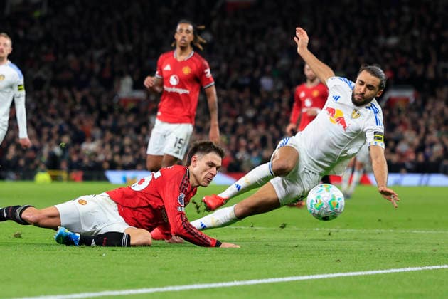 Manchester United, ManU v Leeds United, Premier League Manuel Ugarte (25) of Manchester United challenges Dominic Calvert-Lewin (9) of Leeds United during the Premier League match between Manchester United and Leeds United at Old Trafford, Manchester, UK on 13 April 2026. Manchester Old Trafford Greater Manchester UK Editorial use only DataCo restrictions apply See www.football-dataco.com , Copyright: xConorxMolloyx PSI-24063-0102