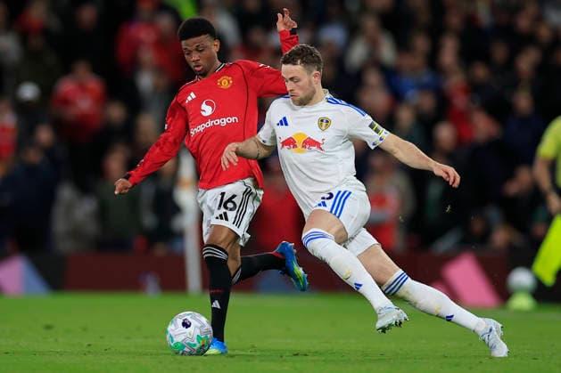 Manchester United, ManU v Leeds United, Premier League Gabriel Gudmundsson (3) of Leeds United is challenged by Amad Diallo (16) of Manchester United during the Premier League match between Manchester United and Leeds United at Old Trafford, Manchester, UK on 13 April 2026. Manchester Old Trafford Greater Manchester UK Editorial use only DataCo restrictions apply See www.football-dataco.com , Copyright: xConorxMolloyx PSI-24063-0122