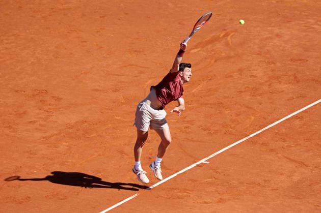 De Minaur v Ofner - Real Club de Tenis Barcelona 1899 Sebastian Ofner competes against Alex de Minaur during the round of 32 match on Day Two of the Barcelona Open Banc Sabadell 73rd Conde de Godo Trophy at Real Club de Tenis Barcelona 1899 in Barcelona, Spain, on April 14, 2026. Barcelona Barcelona Spain  Copyright: xUrbanandsportx originalFilename:urbanandsport-ofnervde260414_npuWq.jpg