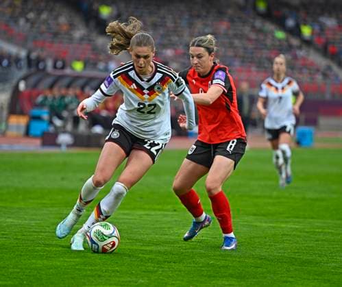 14 04 2026, World Cup Qualification Europe, Women 2026, Matchday 3, Germany Austria, at Max Morlock Stadium Nuremberg, f l Jule Brand Germany vs Barbara Dunst Austria