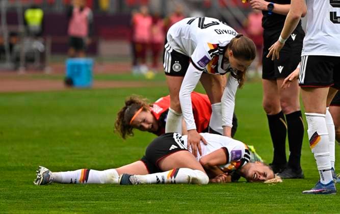 14 04 2026, World Cup Qualification Europe, Women 2026, Matchday 3, Germany Austria, in the Max Morlock Stadium Nuremberg, Giulia Gwinn Germany battered on the ground