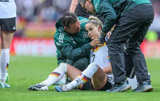 GER, Nuremberg, Germany vs Austria, International Match, Football, FIFA, 2026 2027 Season, World Cup Qualification, Max Morlock Stadium, 3 Matchday in Picture Injury to Giulia Gwinn Germany Women 7 , Pain DFB DFL REGULATIONS PROHIBIT ANY USE OF PHOTOGRAPHS AS IMAGE SEQUENCES AND OR QUASI VIDEO, 14 04 2026 Copyright: HMBxMedia HendrikxHamelau