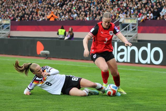 14 04 2026 Soccer Women 2025 2026 World Cup Qualification Europe 3 Matchday Germany Austria Max Morlock Stadium Nuremberg Vivien Endemann Germany, 8, white in duel with Sarah Gutmann Austria, 3, red Nuremberg Bavaria Germany
