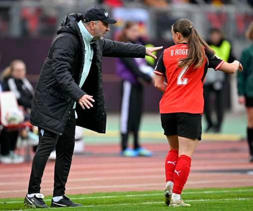 14 04 2026, World Cup Qualification Europe, Women 2026, Matchday 3, Germany Austria, at Max Morlock Stadium Nuremberg, from left coach AlexanderÊSchriebl Austria and Chiara D Angelo Austria