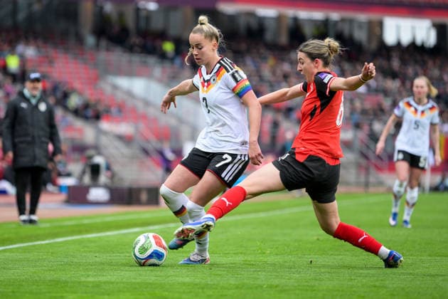 Womens soccer, qualifying for the FIFA Womens World Cup, 20260414, Germany Austria Pictured from l Giulia GWINN Germany, 7 , Barbara DUNST Austria, 8 Nuremberg Max Morlock Stadium Bavaria Germany Copyright: Passion2Press MarkusxFischerx