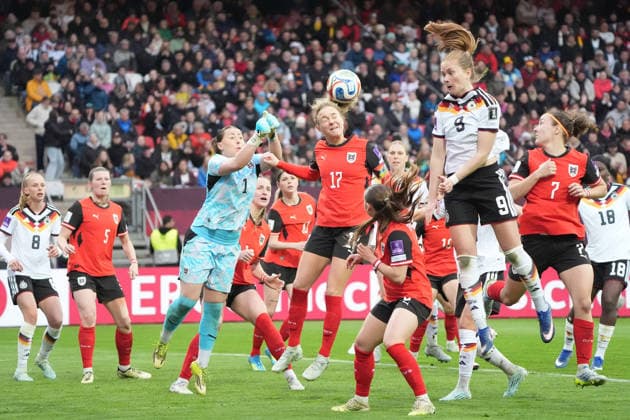 Sarah Puntigam Austria clears with a header Nuremberg 14 04 2026 Germany v Austria, Max Morlock Stadium, Womens World Cup Qualification