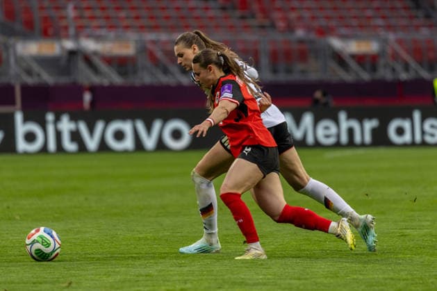 Germany Football World Cup Qualification Europe Women 2026, Matchday 3 Germany vs Austria Max Morlock Stadium Nuremberg Brand Jule German Womens National Team, 22 in duel against D Angelo Chiara Womens National Team Austria, 2 Copyright: xMichellexLukax