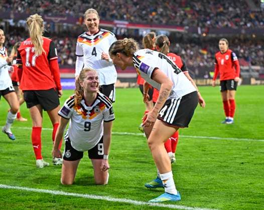 14 04 2026, World Cup Qualification Europe, Women 2026, Matchday 3, Germany Austria, at Max Morlock Stadium Nuremberg, f l Sjoeke Nüsken Germany , Rebecca Knaak Germany and Larissa Mühlhaus Germany cheering