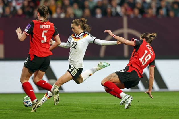14 04 2026, xovx, Football Womens World Cup Qualification, Germany Austria f l Claudia Wenger Austria , Jule Brand Germany with the goal to 4 0, Verena Hanshaw Austria Nuremberg Max Morlock Stadion Bayern Germany DE