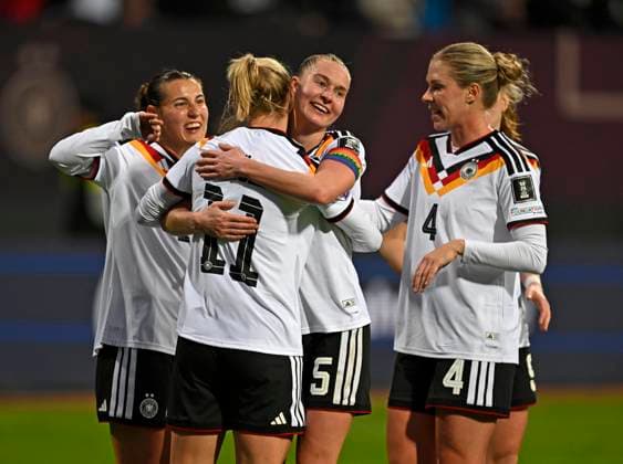 14 04 2026, World Cup Qualification Europe, Women 2026, Matchday 3, Germany Austria, at Max Morlock Stadium Nuremberg, Goal celebration Lea Schüller Germany hugs Janina Minge Germany and Rebecca Knaak Germany