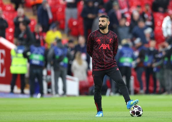 Liverpool, England, 14th April 2026. Mohamed Salah of Liverpool warms up before the Liverpool vs Paris Saint Germain UEFA Champions League quarter final 2nd leg match at Anfield, Liverpool. Picture credit should read: Jessica Hornby Sportimage EDITORIAL USE ONLY. No use with unauthorised audio, video, data, fixture lists, club league logos or live services. Online in-match use limited to 120 images, no video emulation. No use in betting, games or single club league player publications. SPI_025_JH_Liverpool_PSG SPI-4687-0029