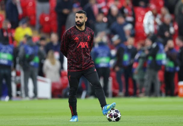 Liverpool, England, 14th April 2026. Mohamed Salah of Liverpool warms up before the Liverpool vs Paris Saint Germain UEFA Champions League quarter final 2nd leg match at Anfield, Liverpool. Picture credit should read: Jessica Hornby Sportimage EDITORIAL USE ONLY. No use with unauthorised audio, video, data, fixture lists, club league logos or live services. Online in-match use limited to 120 images, no video emulation. No use in betting, games or single club league player publications. SPI_026_JH_Liverpool_PSG SPI-4687-0030
