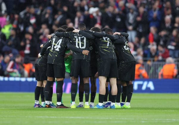 Liverpool, England, 14th April 2026. Paris St Germain pre match huddle during the Liverpool vs Paris Saint Germain UEFA Champions League quarter final 2nd leg match at Anfield, Liverpool. Picture credit should read: Jessica Hornby Sportimage EDITORIAL USE ONLY. No use with unauthorised audio, video, data, fixture lists, club league logos or live services. Online in-match use limited to 120 images, no video emulation. No use in betting, games or single club league player publications. SPI_048_JH_Liverpool_PSG SPI-4687-0047