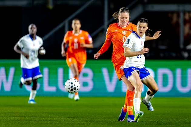 BREDA Netherlands player Wieke Kaptein, France player Anaele Le Moguedec during the European qualifying match between the Netherlands and France at Rat Verlegh Stadium on April 14 in Breda, the Netherlands Photo by DeFodi Images