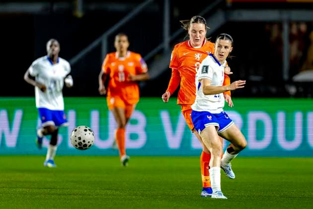 BREDA Netherlands player Wieke Kaptein, France player Anaele Le Moguedec during the European qualifying match between the Netherlands and France at Rat Verlegh Stadium on April 14 in Breda, the Netherlands Photo by DeFodi Images