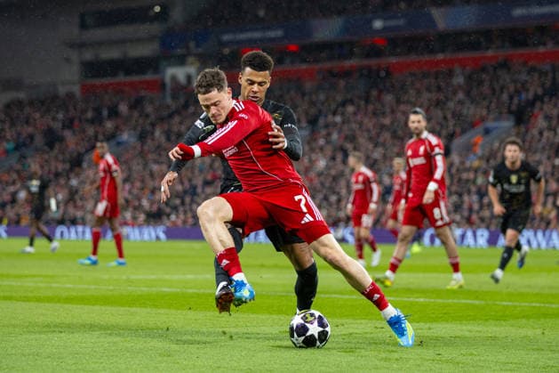 Football - UEFA Champions League - Quarter-Final - 2nd Leg - Liverpool FC v Paris Saint-Germain FC LIVERPOOL, ENGLAND - Tuesday, April 14, 2026: Liverpool s Florian Wirtz (L) is challenged by Paris Saint-Germain s DÃ sirÃ DouÃ during the UEFA Champions League Quarter-Final 2nd Leg match between Liverpool FC and Paris Saint-Germain FC at Anfield. (Photo by David Rawcliffe Propaganda) LIVERPOOL Anfield MERSEYSIDE ENGLAND  Copyright: xDavidxRawcliffex P2026-04-14-Liverpool_PSG-50