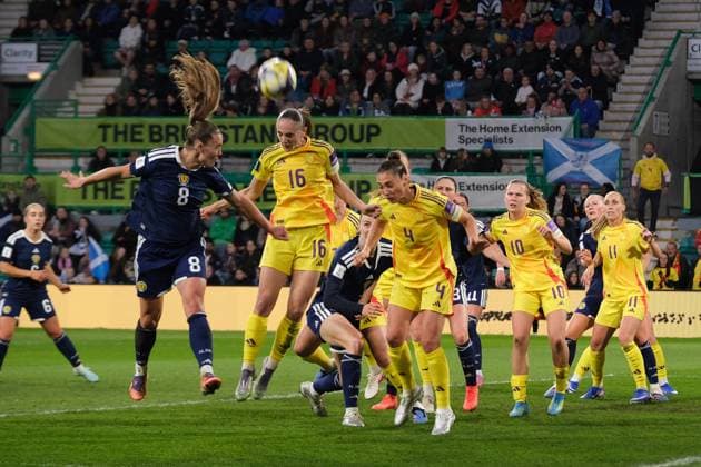 UK: Scotland v Belgium, FIFA Women s World Cup qualifier at Easter Road Stadium, Edinburgh, Scotland on 14 April 2026: Pictured: Zenia Mertens (Belgium) heads clear from Miri Taylor (Scotland) Edinburgh Easter Road Stadium Scotland Copyright: xAlexxToddx