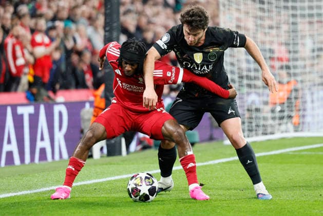 Liverpool FC v Paris Saint-Germain FC - UEFA Champions League 2025 26 Quarter-Final Second Leg Jeremie Frimpong of Liverpool and Vitinha of Paris Saint-Germain challenge during the UEFA Champions League 2025 26 Quarter-Final Second Leg match between Liverpool FC and Paris Saint-Germain FC at Anfield on April 14, 2026 in Liverpool, England. WARNING! This Photograph May Only Be Used For Newspaper And Or Magazine Editorial Purposes. May Not Be Used For Publications Involving 1 player, 1 Club Or 1 Competition Without Written Authorisation From Football DataCo Ltd. For Any Queries, Please Contact Football DataCo Ltd on +44 (0) 207 864 9121 Liverpool Anfield England United Kingdom Copyright: xAllstarxPicturexLibraryxLtdx