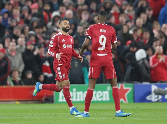 Liverpool, England, 14th April 2026. Mohamed Salah of Liverpool (l) runs on to replace Hugo Ekitike of Liverpool during the Liverpool vs Paris Saint Germain UEFA Champions League quarter final 2nd leg match at Anfield, Liverpool. Picture credit should read: Jessica Hornby Sportimage EDITORIAL USE ONLY. No use with unauthorised audio, video, data, fixture lists, club league logos or live services. Online in-match use limited to 120 images, no video emulation. No use in betting, games or single club league player publications. SPI_069_JH_Liverpool_PSG SPI-4687-0069
