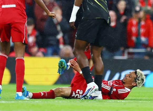 Hugo Ekitike of Liverpool feels the pain from an injury Liverpool v Paris Saint-Germain, UEFA Champions League, Quarter Final, Second Leg, Football, Anfield, Liverpool, UK - 14 Apr 2026Liverpool Anfield France EDITORIAL USE ONLY No use with unauthorised audio, video, data, fixture lists, club league logos or live services. Online in-match use limited to 120 images, no video emulation. No use in betting, games or single club league player publications.  Copyright: xMattxWest Shutterstockx 16828520ad