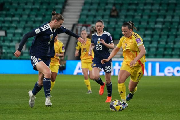 RECORD DATE NOT STATED 14th April 2026; Easter Road, Edinburgh, Scotland; Womens World Cup Qualifier Football, Scotland versus Belgium; Hannah Eurlings of Belgium runs down the wing with the ball and feels pressure from Jenna Clark of Scotland AlecxBrown