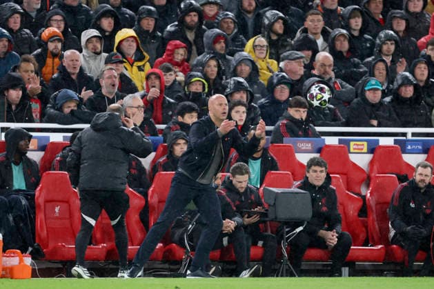 Liverpool FC v Paris Saint-Germain FC - UEFA Champions League 2025 26 Quarter-Final Second Leg Arne Slot, Manager of Liverpool catches the ball in the rain during the UEFA Champions League 2025 26 Quarter-Final Second Leg match between Liverpool FC and Paris Saint-Germain FC at Anfield on April 14, 2026 in Liverpool, England. WARNING! This Photograph May Only Be Used For Newspaper And Or Magazine Editorial Purposes. May Not Be Used For Publications Involving 1 player, 1 Club Or 1 Competition Without Written Authorisation From Football DataCo Ltd. For Any Queries, Please Contact Football DataCo Ltd on +44 (0) 207 864 9121 Liverpool Anfield England United Kingdom Copyright: xAllstarxPicturexLibraryxLtdx