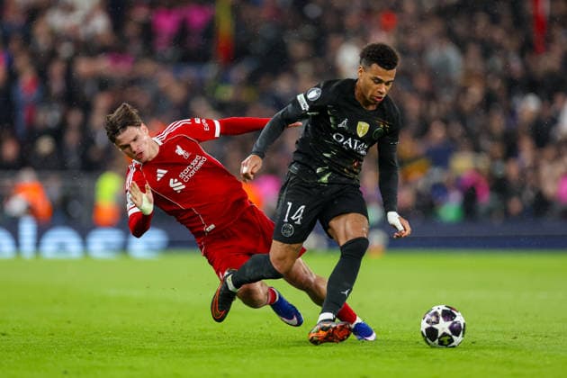 Football - UEFA Champions League - Quarter-Final - 2nd Leg - Liverpool FC v Paris Saint-Germain FC LIVERPOOL, ENGLAND - Tuesday, April 14, 2026: Liverpool s Milos Kerkez (L) challenges Paris Saint-Germain s DÃ sirÃ DouÃ during the UEFA Champions League Quarter-Final 2nd Leg match between Liverpool FC and Paris Saint-Germain FC at Anfield. (Photo by David Rawcliffe Propaganda) LIVERPOOL Anfield MERSEYSIDE ENGLAND  Copyright: xDavidxRawcliffex P2026-04-14-Liverpool_PSG-73