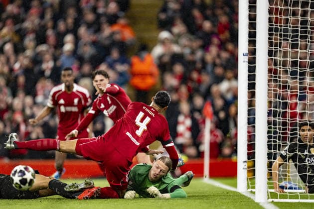 Liverpool v Paris Saint-Germain - UEFA Champions League 2025 26 LIVERPOOL, ENGLAND- APRIL 14: Matvey Safonov of Paris Saint-Germain making a save from Virgil van Dijk of Liverpool during a UEFA Champions League 2025 26 match between Liverpool and Paris Saint-Germain in Liverpool on April 14, 2026 (Photo by Will Palmer Sports Press Photo) LiverpoolUnited Kingdom  Copyright: xWillxPalmer SportsxPressxPhotox