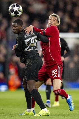 Liverpool v Paris Saint-Germain - UEFA Champions League 2025 26 LIVERPOOL, ENGLAND- APRIL 14: Hugo Ekitike of Liverpool and Nuno Mendes of Paris Saint-Germain fight for possession during a UEFA Champions League 2025 26 match between Liverpool and Paris Saint-Germain in Liverpool on April 14, 2026 (Photo by Will Palmer Sports Press Photo) LiverpoolUnited Kingdom  Copyright: xWillxPalmer SportsxPressxPhotox