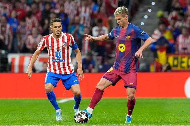 Atletico de Madrid s Koke Resurreccion (l) and FC Barcelona, Barca s Dani Olmo during Champions League 2025 2026, Quarter-finals 2nd leg match. April 14 ,2026. (20260414150)