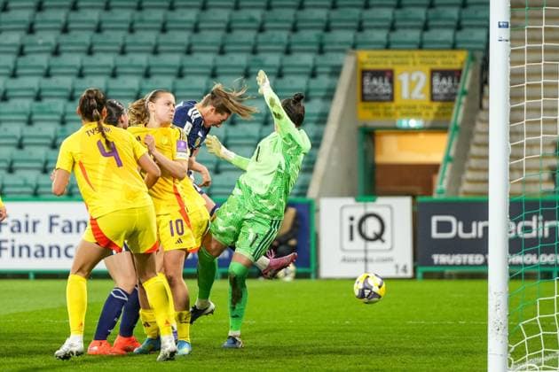 Kathleen McGovern of Scotland Women heads the ball wide of the Belgium goal under press ire from Belgium Women goalkeeper Nicky Evrard. Scotland Women v Belgium Women, FIFA 2027 Women s World Cup Qualifying, Football, Easter Road, Edinburgh, UK - 14 Apr 2026Edinburgh Easter Road United Kingdom EDITORIAL USE ONLY No use with unauthorised audio, video, data, fixture lists, club league logos or live services. Online in-match use limited to 120 images, no video emulation. No use in betting, games or single club league player publications. Copyright: xStuartxWallace Shutterstockx 16828526ai
