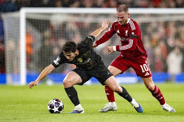 Liverpool v Paris Saint-Germain - UEFA Champions League 2025 26 LIVERPOOL, ENGLAND- APRIL 14: Joao Neves of Paris Saint-Germain and Alexis Mac Allister of Liverpool fight for possession during a UEFA Champions League 2025 26 match between Liverpool and Paris Saint-Germain in Liverpool on April 14, 2026 (Photo by Will Palmer Sports Press Photo) LiverpoolUnited Kingdom  Copyright: xWillxPalmer SportsxPressxPhotox