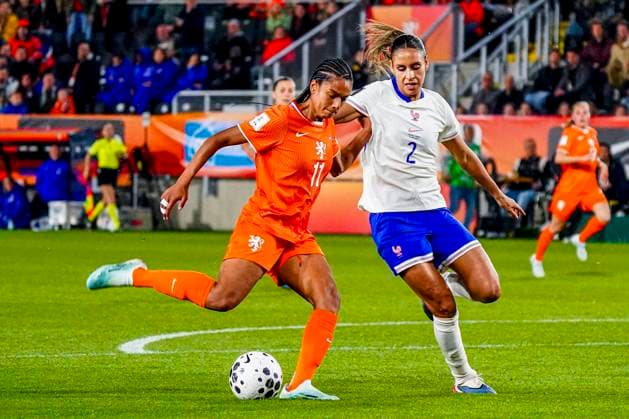 Esmee Brugts of the Netherlands shoots under pressure from Maelle Lakrar of France Netherlands v France, FIFA Women s World Cup 2027 Qualifier, Netherlands v France, Rat Verlegh Stadion, April 14, 2026, Breda, Netherlands.